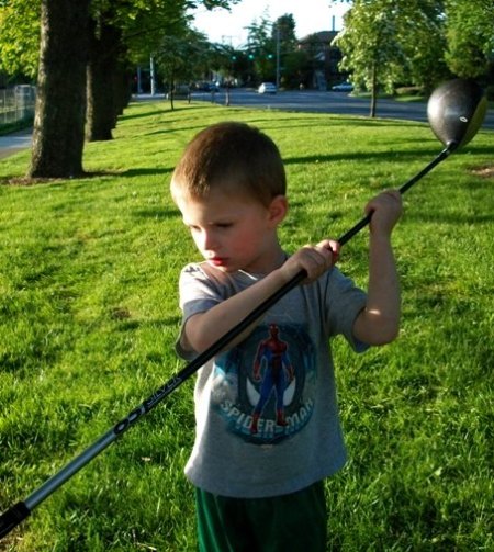 Little Phil pulls Big Bertha from the bag. 